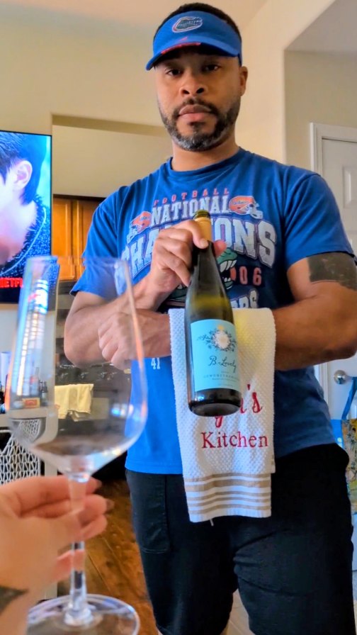 Instagram post by @snacksandslowjams for Total Wine & More. Caption reads: Something about Game Day makes Ryan extra excited....