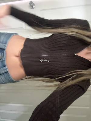 TikTok post by @kalyngx for Tillys. Caption reads: [...] #sweater #falloutfits #OOTD #fyp @Tillys....