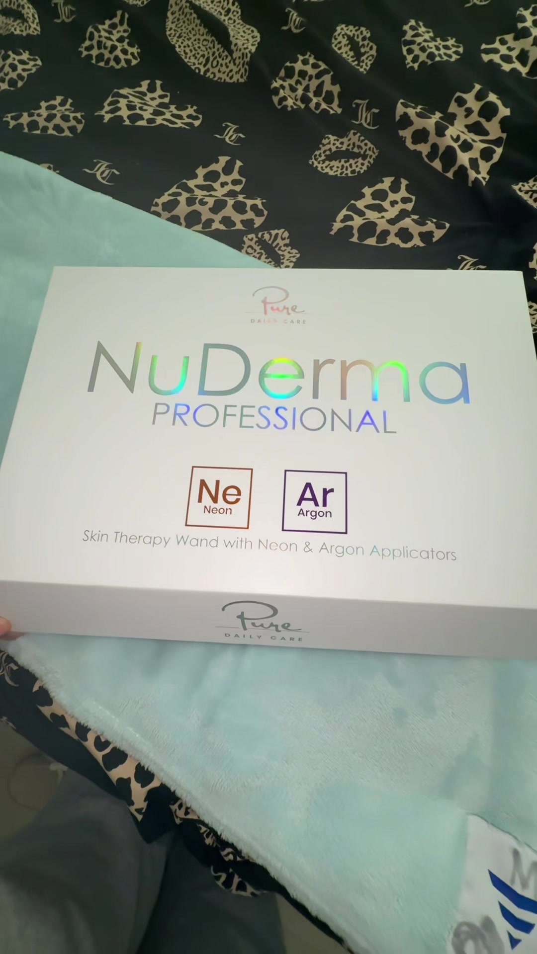 TikTok post by @leahhhbbyy for Pure Daily Care NuDerma Wand. Caption reads: @Pure Daily Care NuDerma Wand #skincare #skin #fyp....