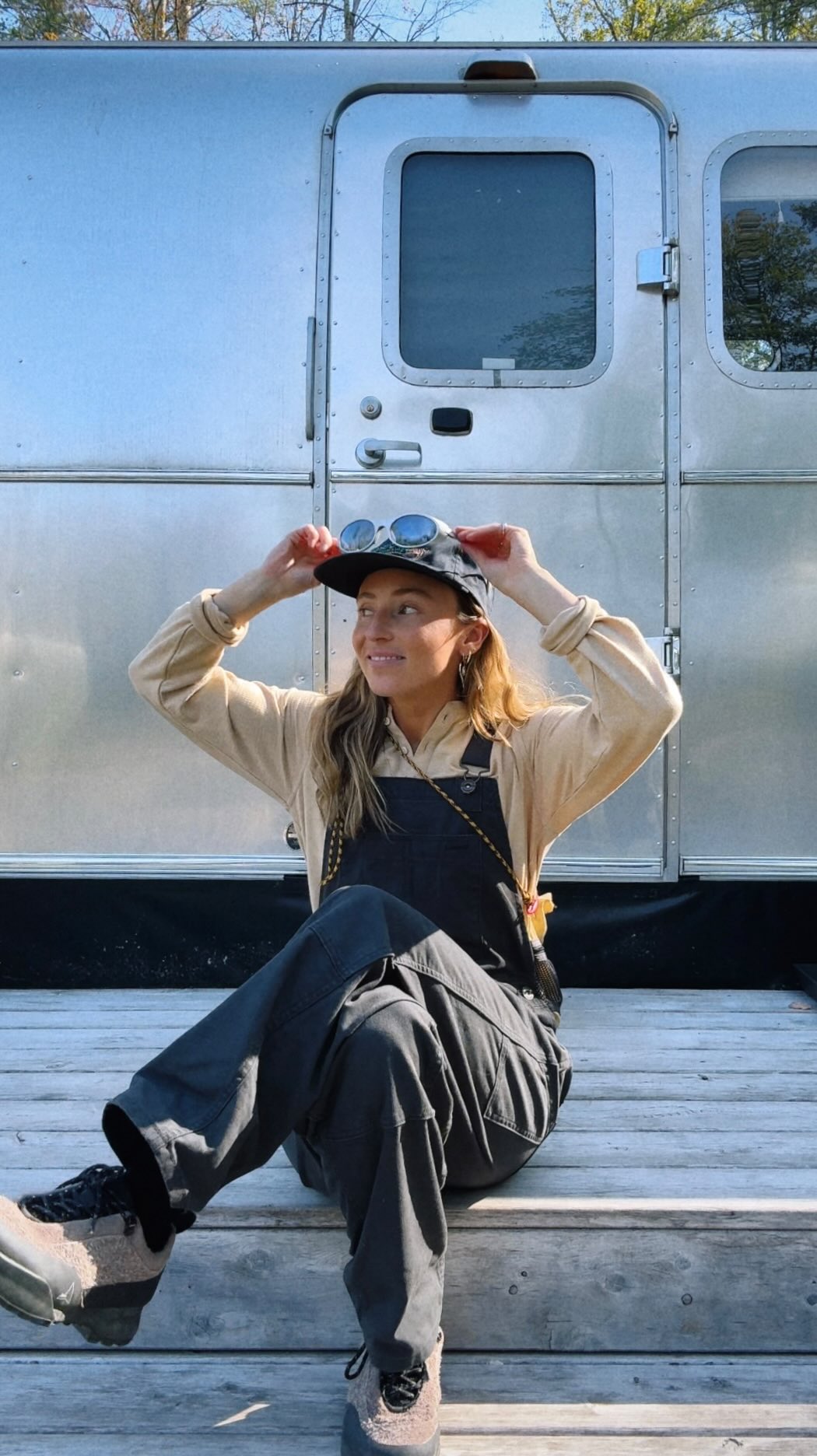 Instagram post by @kellynwilson for REI. Caption reads: Is it even fall without a trip to REI?! Layering....