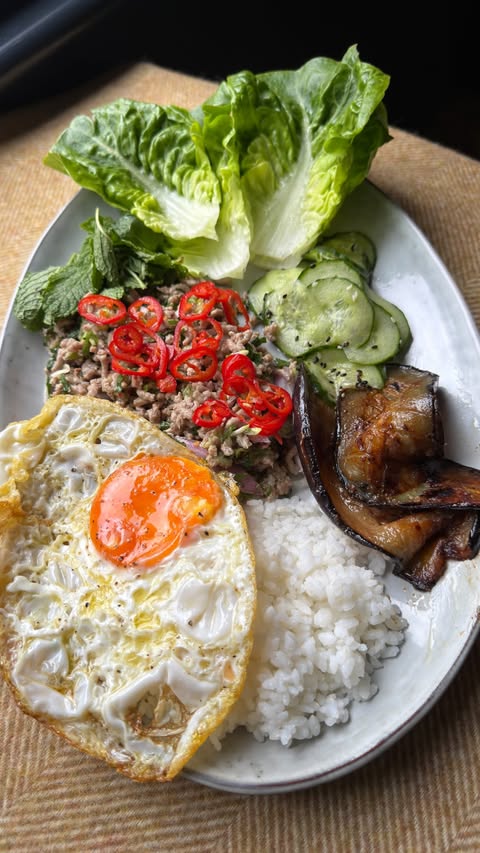 Instagram post by @flavourfellas_ for OXO. Caption reads: [...] Pork Thai Laab Midweek meal prep using OXO’s....