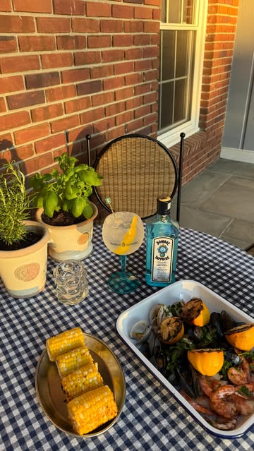 Instagram post by @justines.table for Bombay Sapphire. Caption reads: Seafood on the grill + @bombaysapphireus Sparkling....