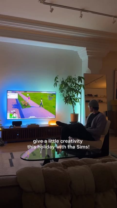Instagram post by @drewfromladue for The Sims. Caption reads: #SponsoredbyEA cozy game night with @thesims !....