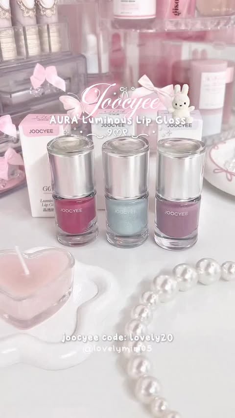 Instagram post by @lovelymiri05 for JOOCYEE. Caption reads: @joocyee_official aura luminous lip gloss 🎀🤍🩰....