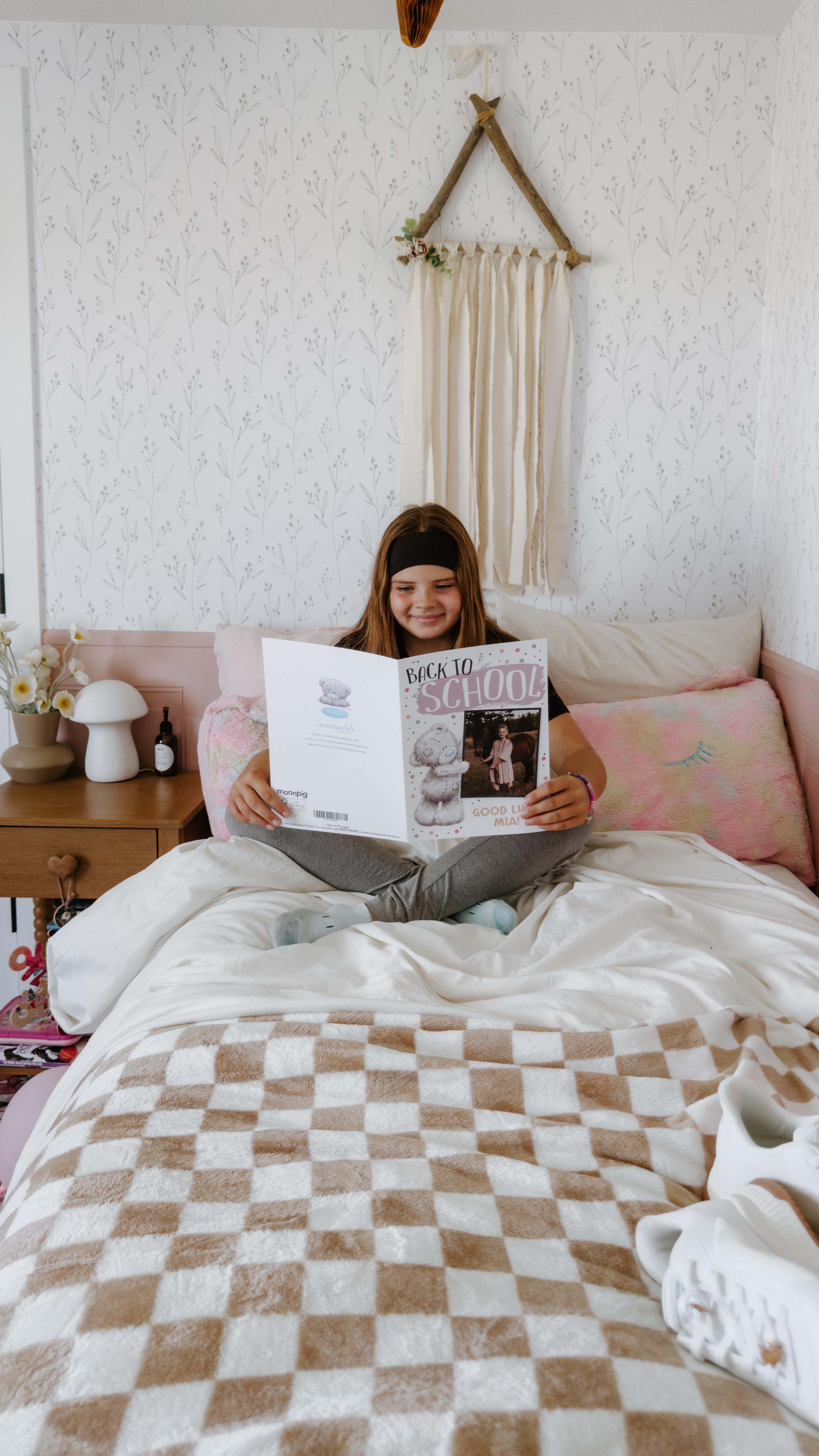 Instagram post by @todaysmodernbebe for Moonpig. Caption reads: #ad First-day jitters, early alarms, and packing....