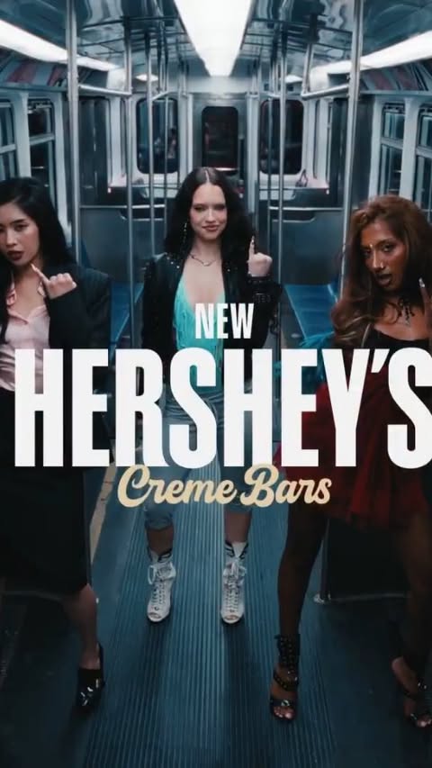 Instagram post by @katseye_brasil for HERSHEY'S Chocolate. Caption reads: 🍫 | IT’S @hersheys OUI OUI!!! Confira comercial....