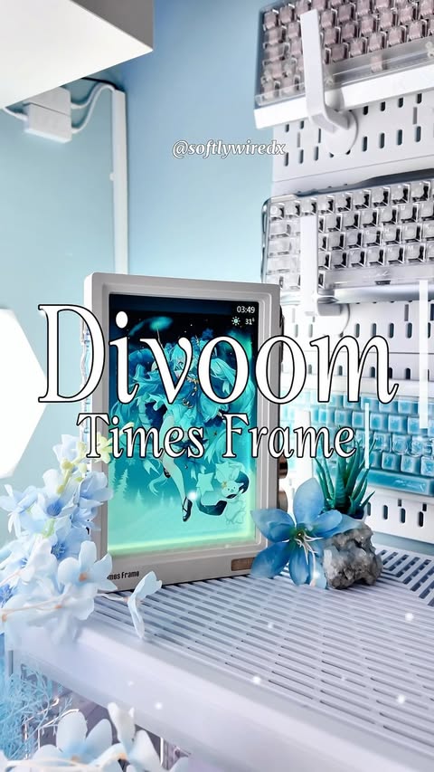 Instagram post by @softlywiredx for Divoom. Caption reads: [...] the stunning Times Frame from @divoom_global....