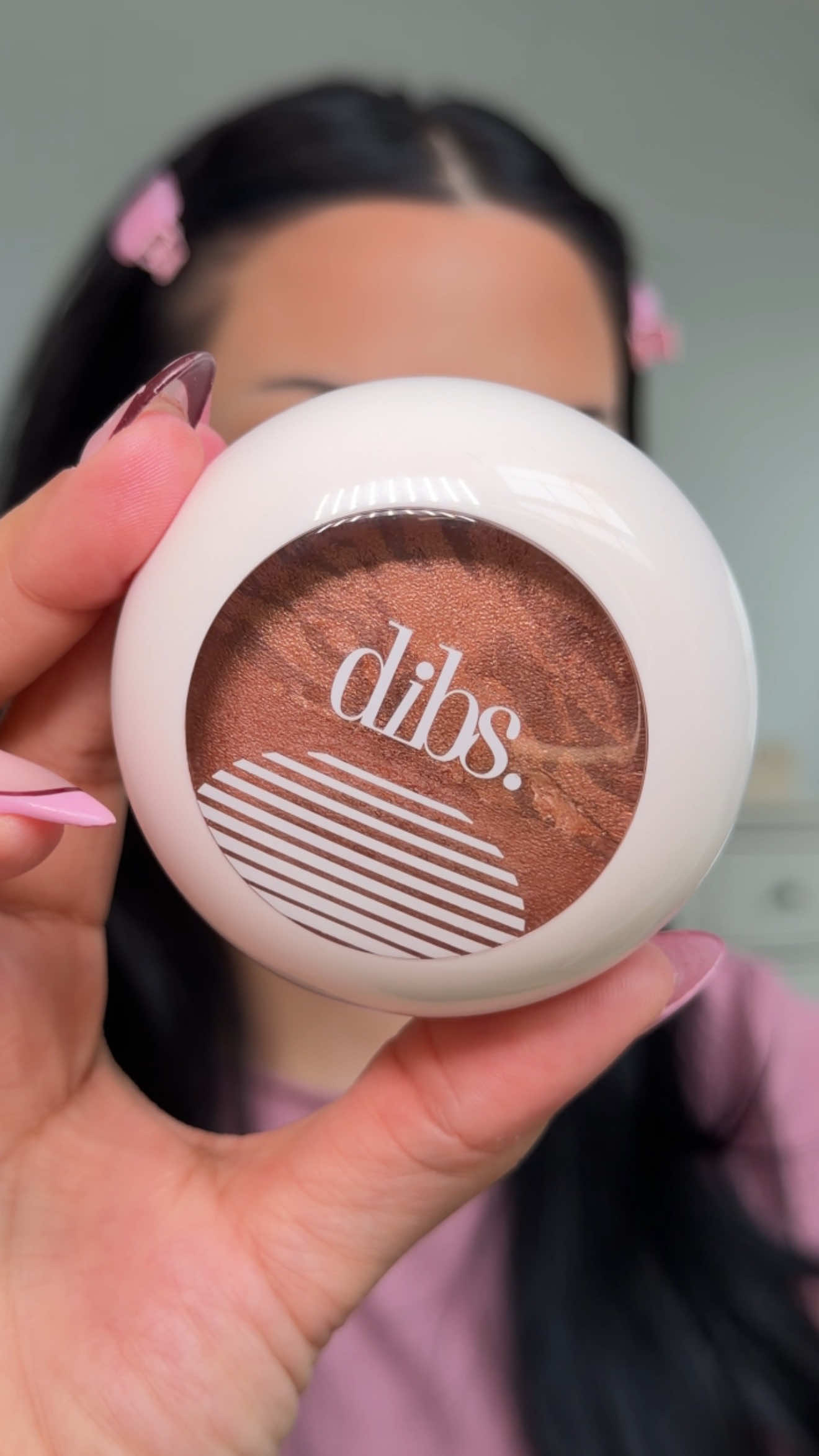 TikTok post by @glambervcruz for DIBS Beauty. Caption reads: My bronzer hack for glowing skin ✨ @DIBSBEAUTY....