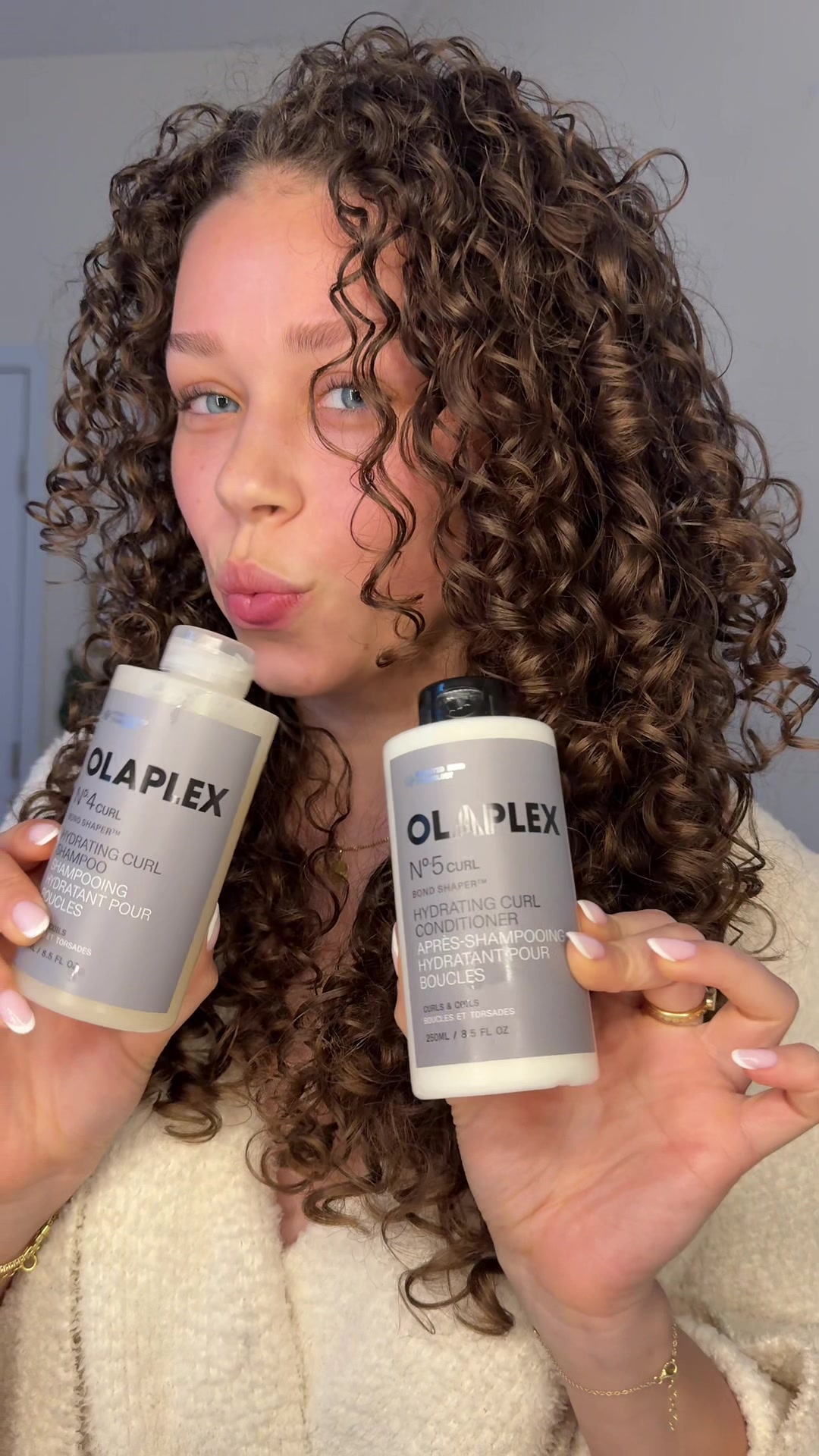 TikTok post by @joyburnettt for OLAPLEX. Caption reads: Meet the newest duo to the @Olaplex family👯‍♀️🤍....