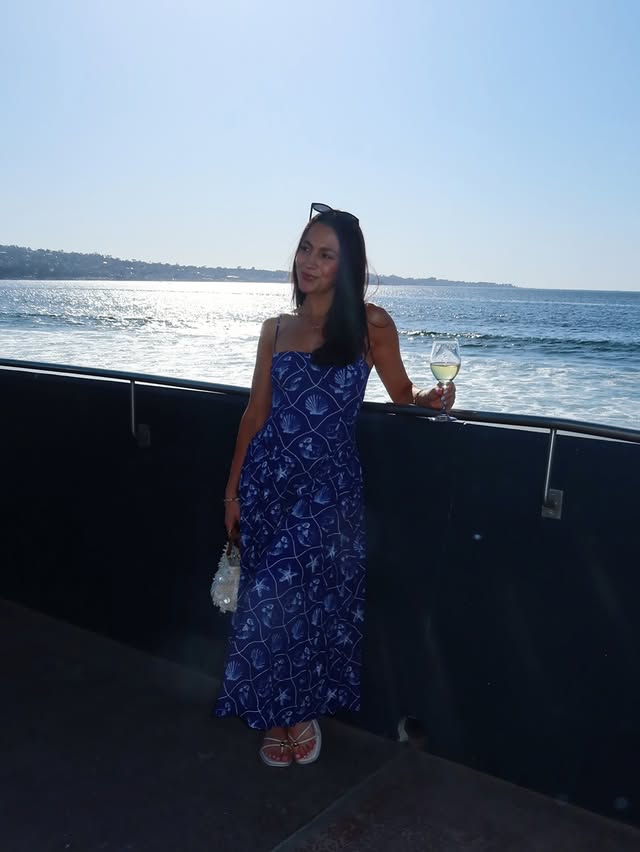 Instagram post by @dietitiancass for Rent the Runway. Caption reads: [...] my California move 👀 Blue dress is....