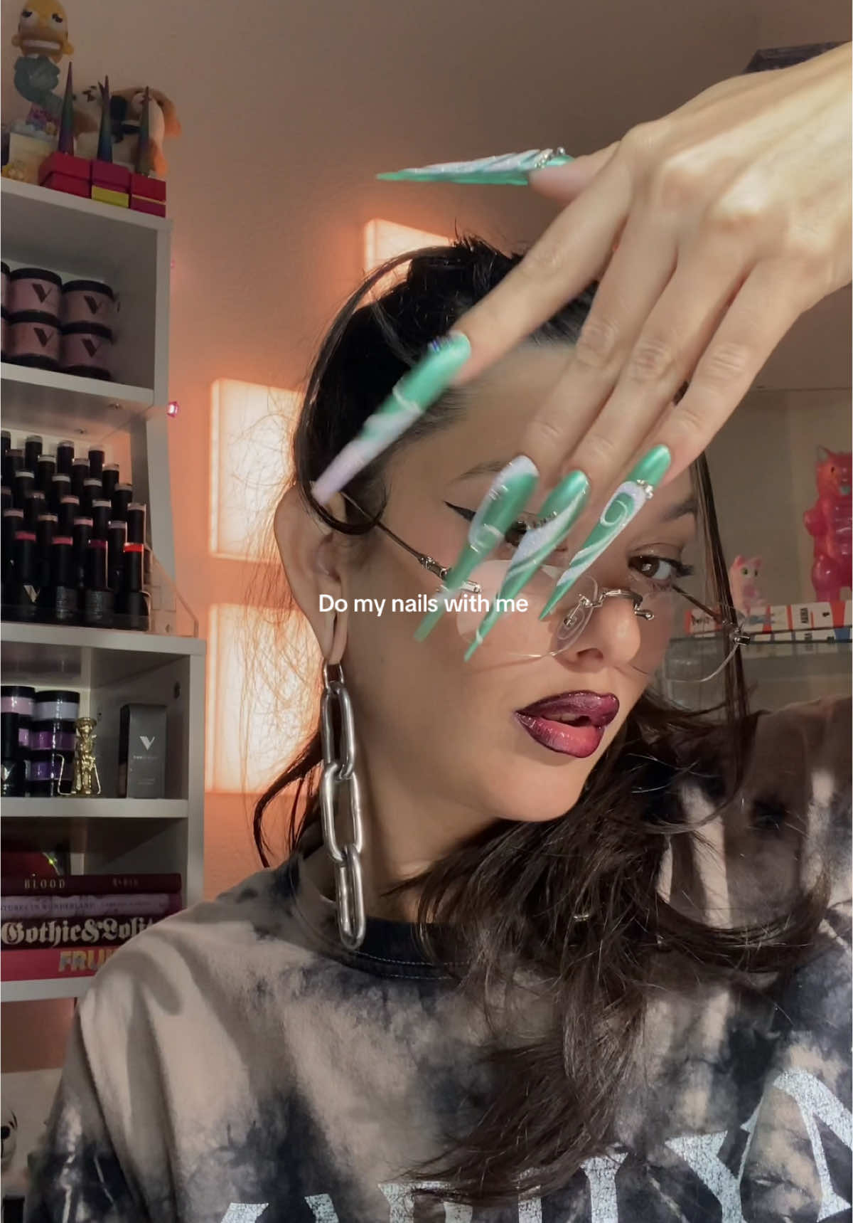 TikTok post by @noodle_yess for VBeautyPure. Caption reads: pastel christmas nail art on xxl stilettos 🤌🎀✨ -....