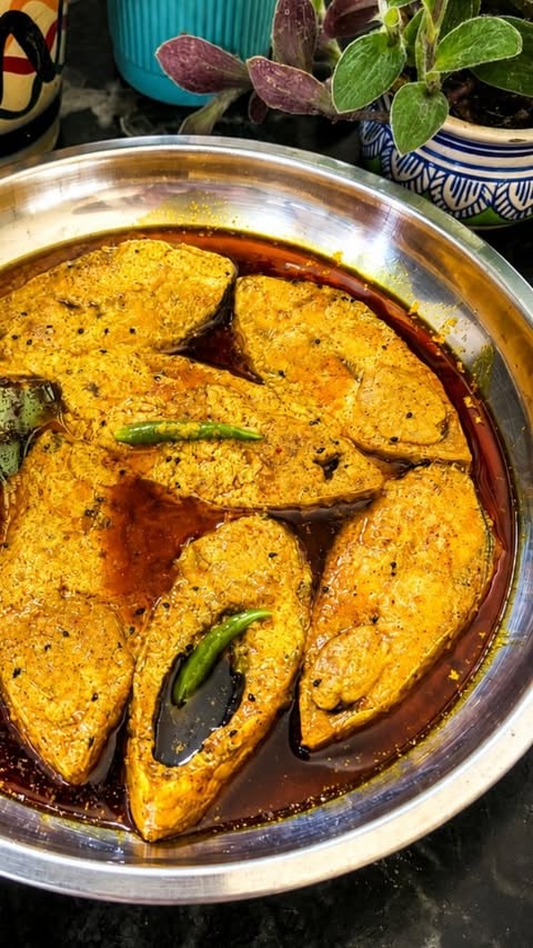 Instagram post by @ma_masi_kitchen for Emami Healthy & Tasty. Caption reads: Ilish Macher Tel Jhol recipe in Bengali! ইলিশ....
