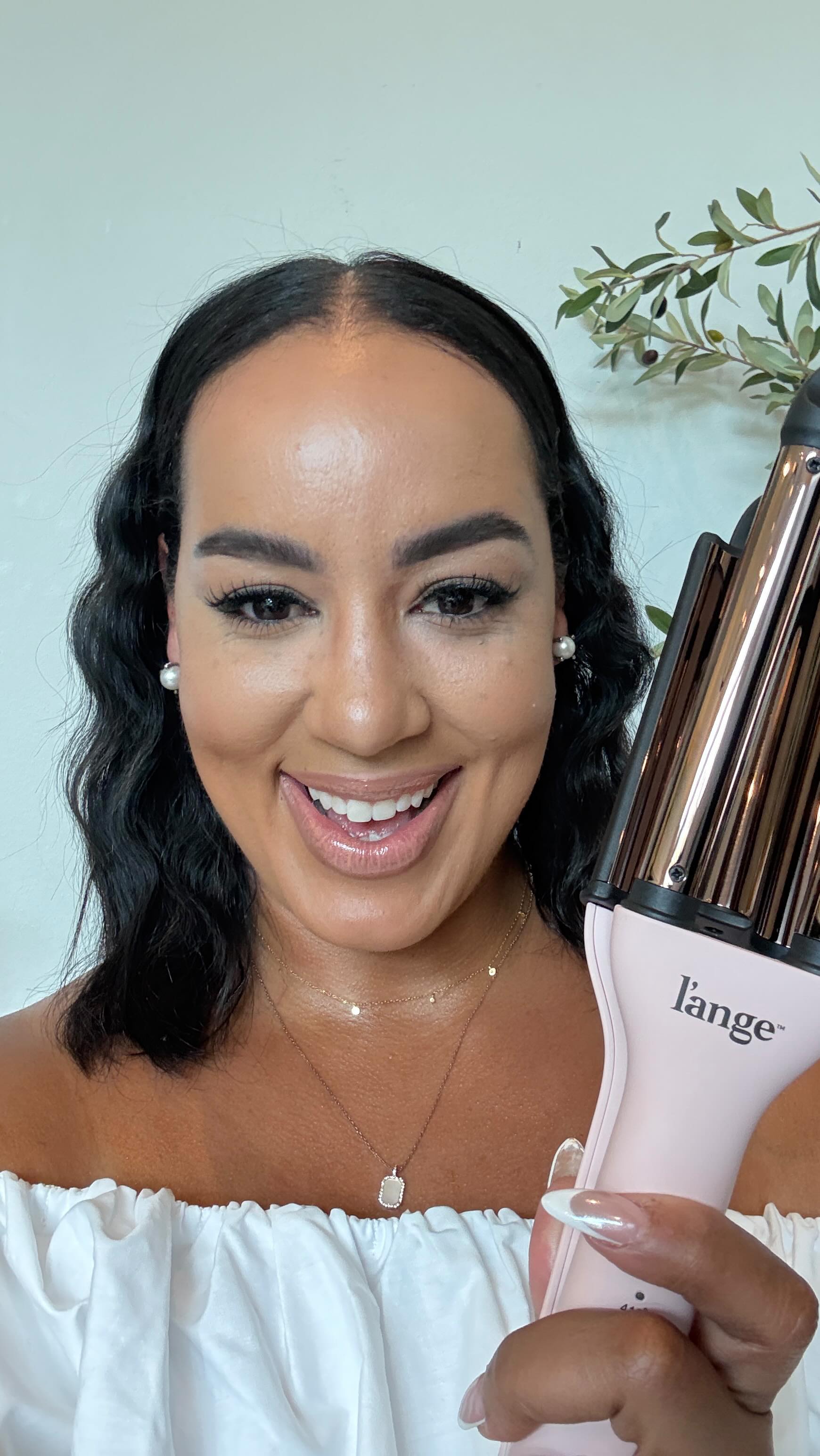 Instagram post by @iambeauticurve for L’ange Hair. Caption reads: Comment WAVES if you want all the products used in....