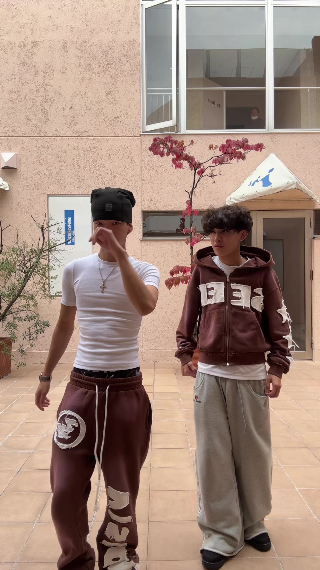 TikTok post by @shadowthekit_y for Timeloop Visionz. Caption reads: Sweatsuits from @timeloopvisionz use code: SHADOW....