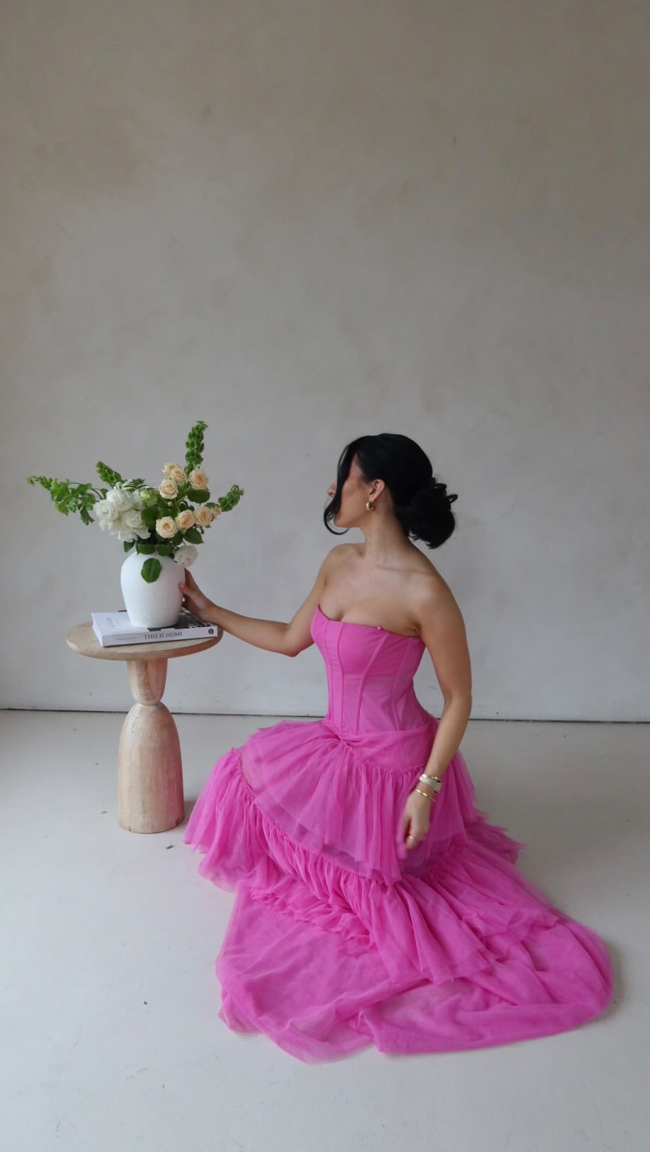 Instagram post by @lifeofluphoria for BCBGMAXAZRIA. Caption reads: hosting a garden party 🌸🍃

dress @bcbgmaxazria....