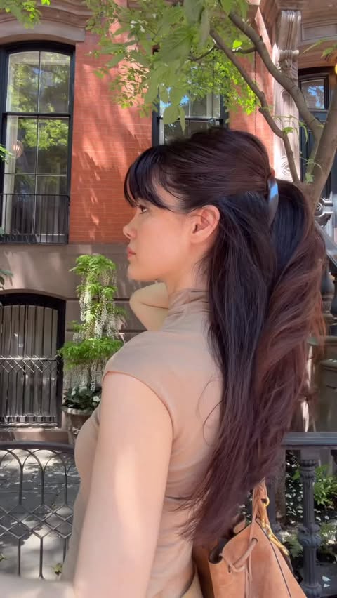 Instagram post by @alykima_ for Aveda. Caption reads: [...] down hair using a banana clip and the @aveda....