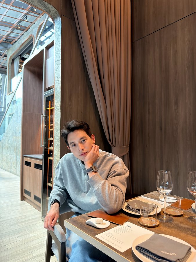 Instagram post by @jirayu_jj for OMEGA. Caption reads: Grey Side of the Moon...where legacy meets....