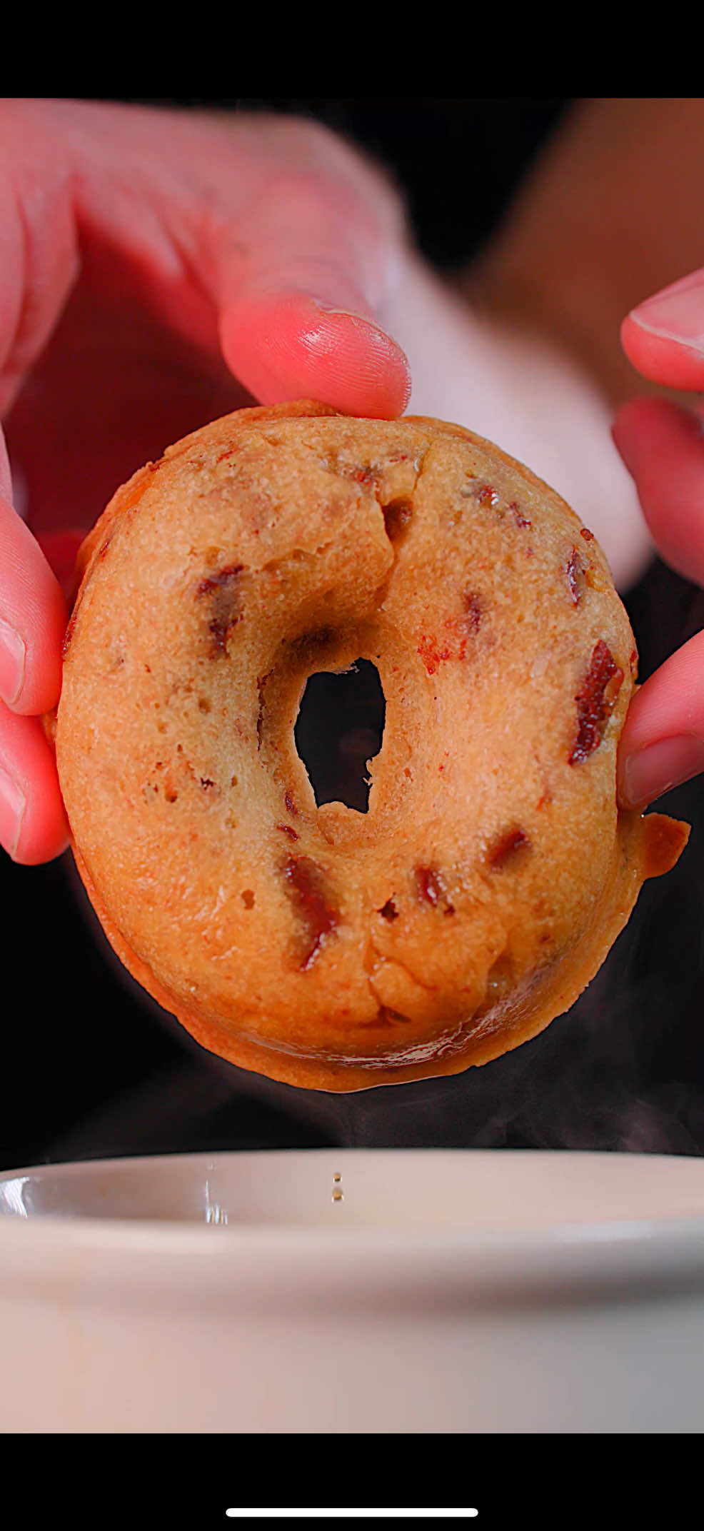 TikTok post by @colinwingerter for Everyday Dose. Caption reads: Chocolate Banana Muffin Donuts with @Everyday Dose....