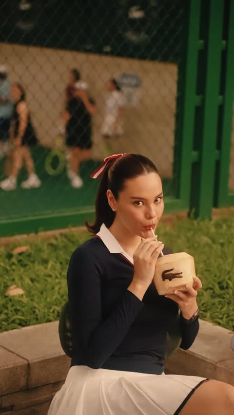 Instagram post by @catriona_gray for Lacoste. Caption reads: Welcome to Le Club @Lacoste 🎾🐊 #Lacoste.