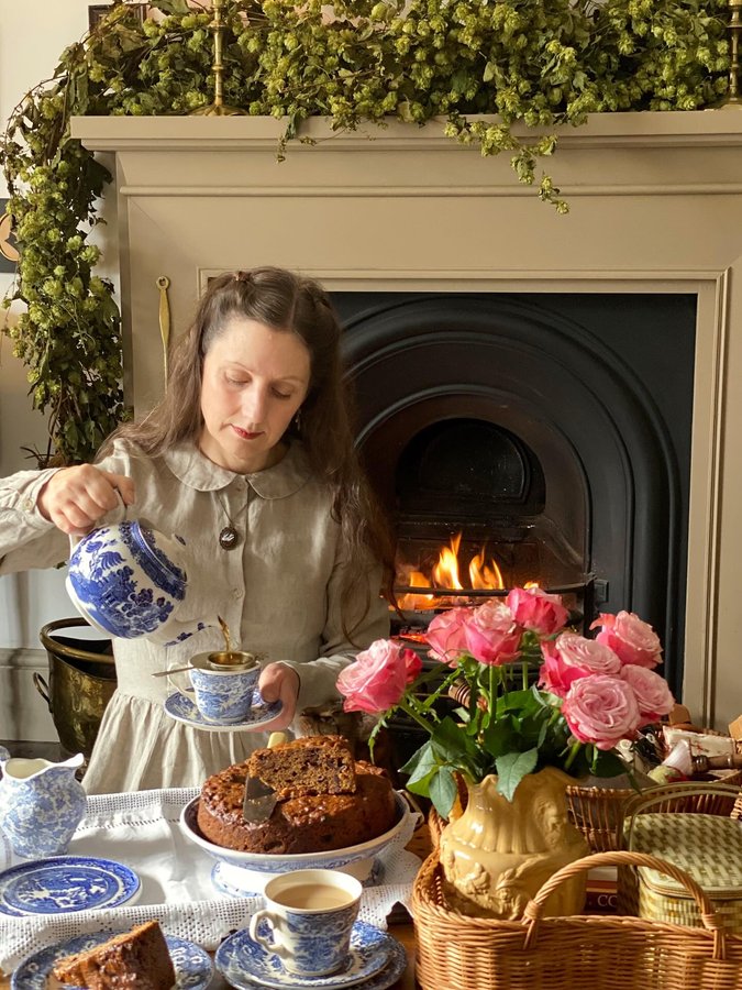 Instagram post by @rememberingtheoldways for Son de Flor. Caption reads: Time for Tea & Cake by the fire on this wet &....