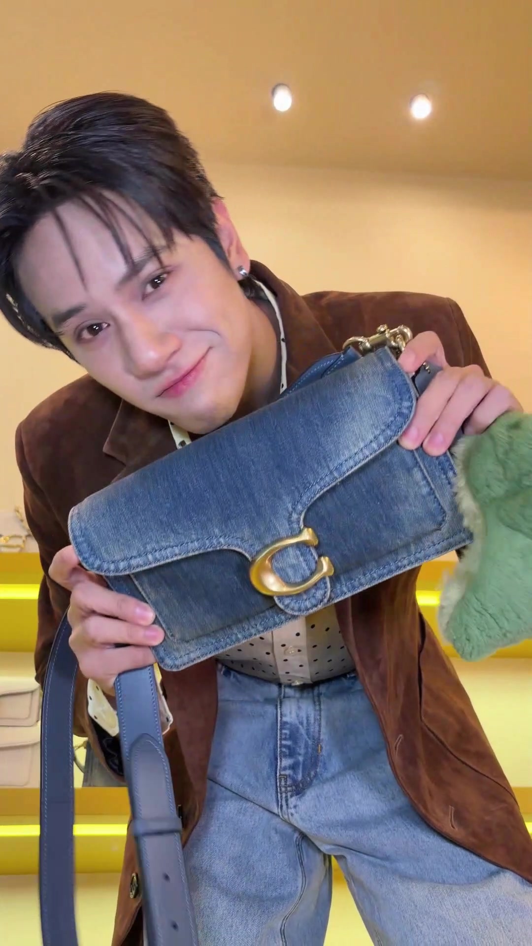 TikTok post by @7r1pl3._.n for Coach. Caption reads: This look makes sense. 📍The Coach Tabby Shop at....