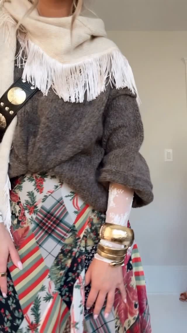 Instagram post by @caitlynwarakomski for Free People. Caption reads: layers on layers @freepeople // comment SHOP and I....