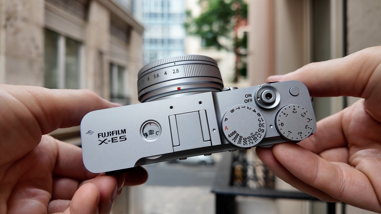 YouTube post by @cameralabs for Redbubble. Caption reads: Fujifilm X-E5 REVIEW: X100 killer?.