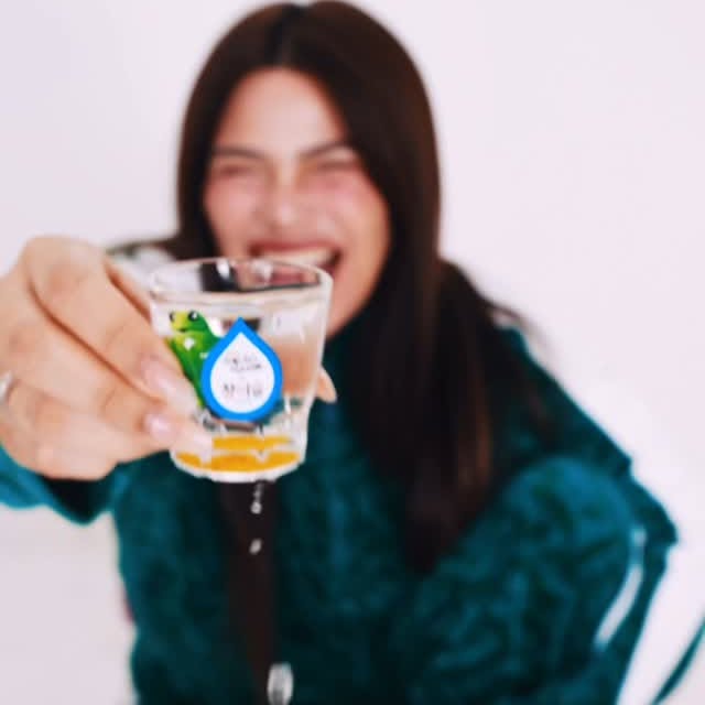 Instagram post by @d_laurel for HiteJinro Global. Caption reads: Red light, green light… but make it boozy.
Squid....