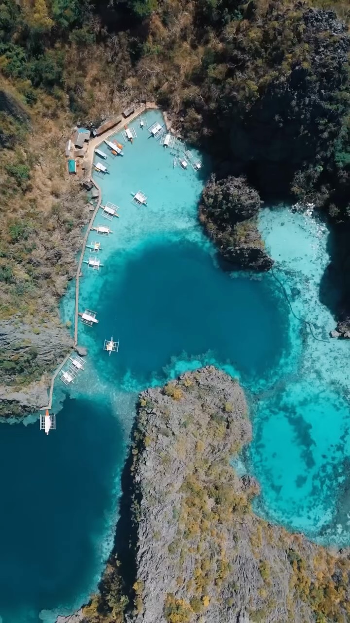 Instagram post by @nicko.stark for National Geographic Travel. Caption reads: Island hopping in the Philippines 🇵🇭

Book your....