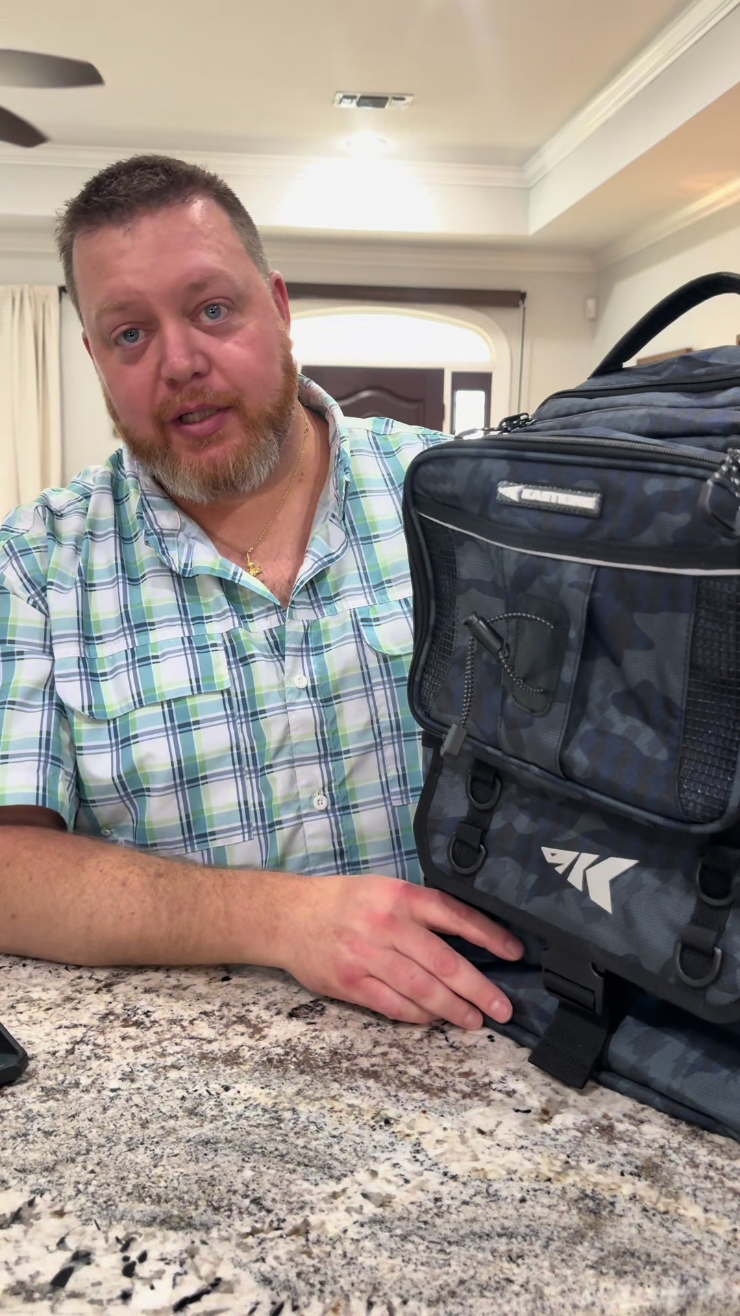 TikTok post by @katie_gazzo for KastKing. Caption reads: Built for serious fishing days 🎣 The KastKing 50L....