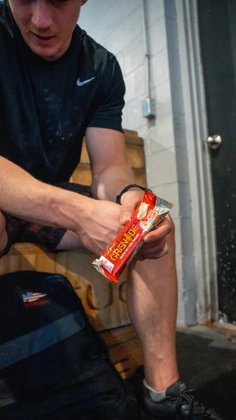 Instagram post by @jackfarlow for Grenade. Caption reads: 55 @grenade.na bars + 20lbs of ruck weight was as....