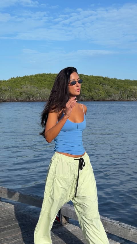 Instagram post by @taynnabrito for FP Movement. Caption reads: head-to-toe @fpmovement for the most perfect kayak....