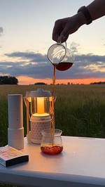 Instagram post by @homeb_arista for HARIO. Caption reads: Beautiful sunset coffee 🧘☀️

Stunning place to....