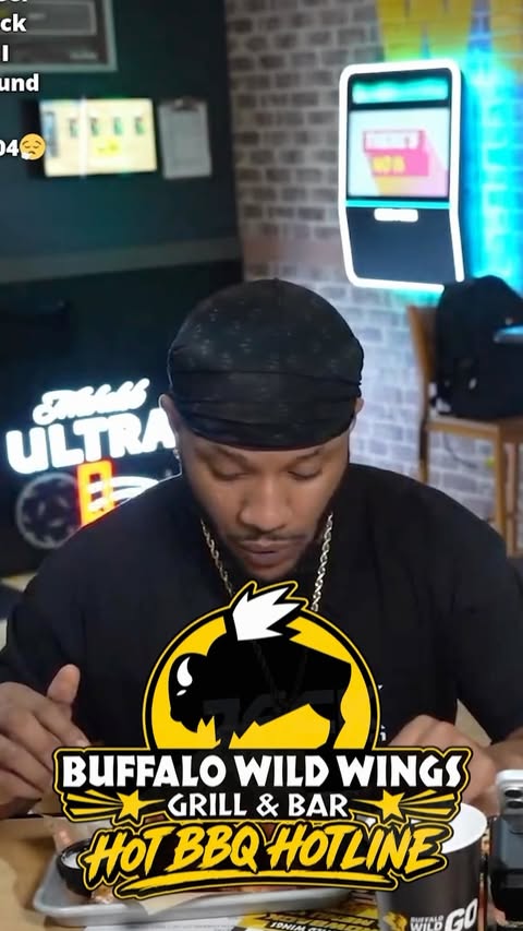 Instagram post by @where_mikejones for Buffalo Wild Wings. Caption reads: We brought Hot BBQ back with the Hot BBQ Hotline....