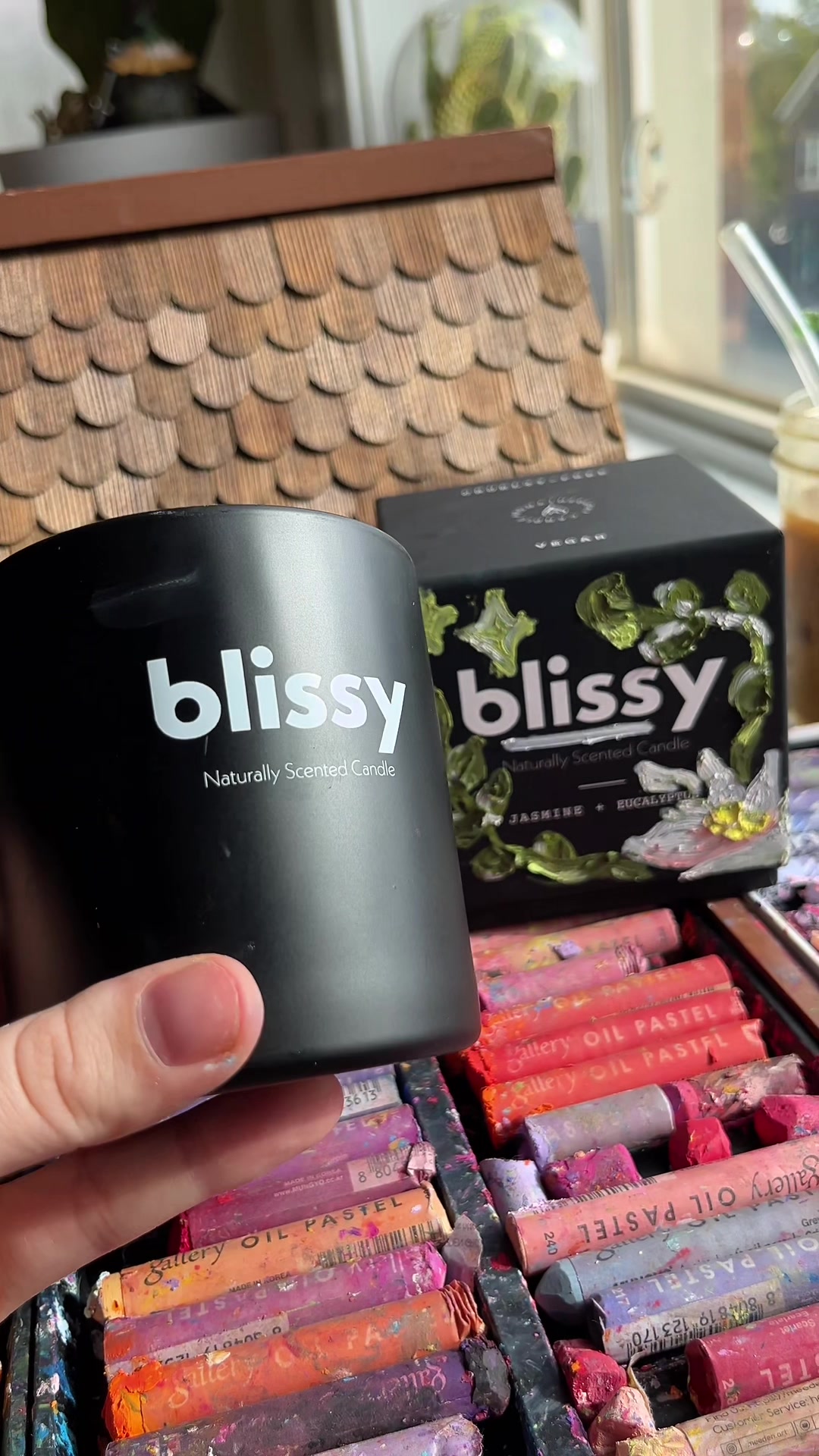TikTok post by @witchmxm for Blissy. Caption reads: new @Blissy Brand candle 🕯️ 🌿🌸🖤✨ #candletok....