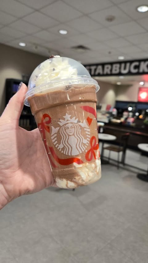 Instagram post by @hip2save for Starbucks. Caption reads: Starbucks for Life is BACK ☕✨ Play daily through....