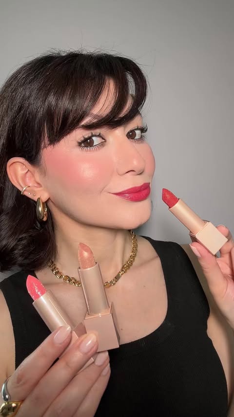 Instagram post by @thedarlingglow for Oulac Cosmetics. Caption reads: #AD | Trying on the gorgeous sparkly....