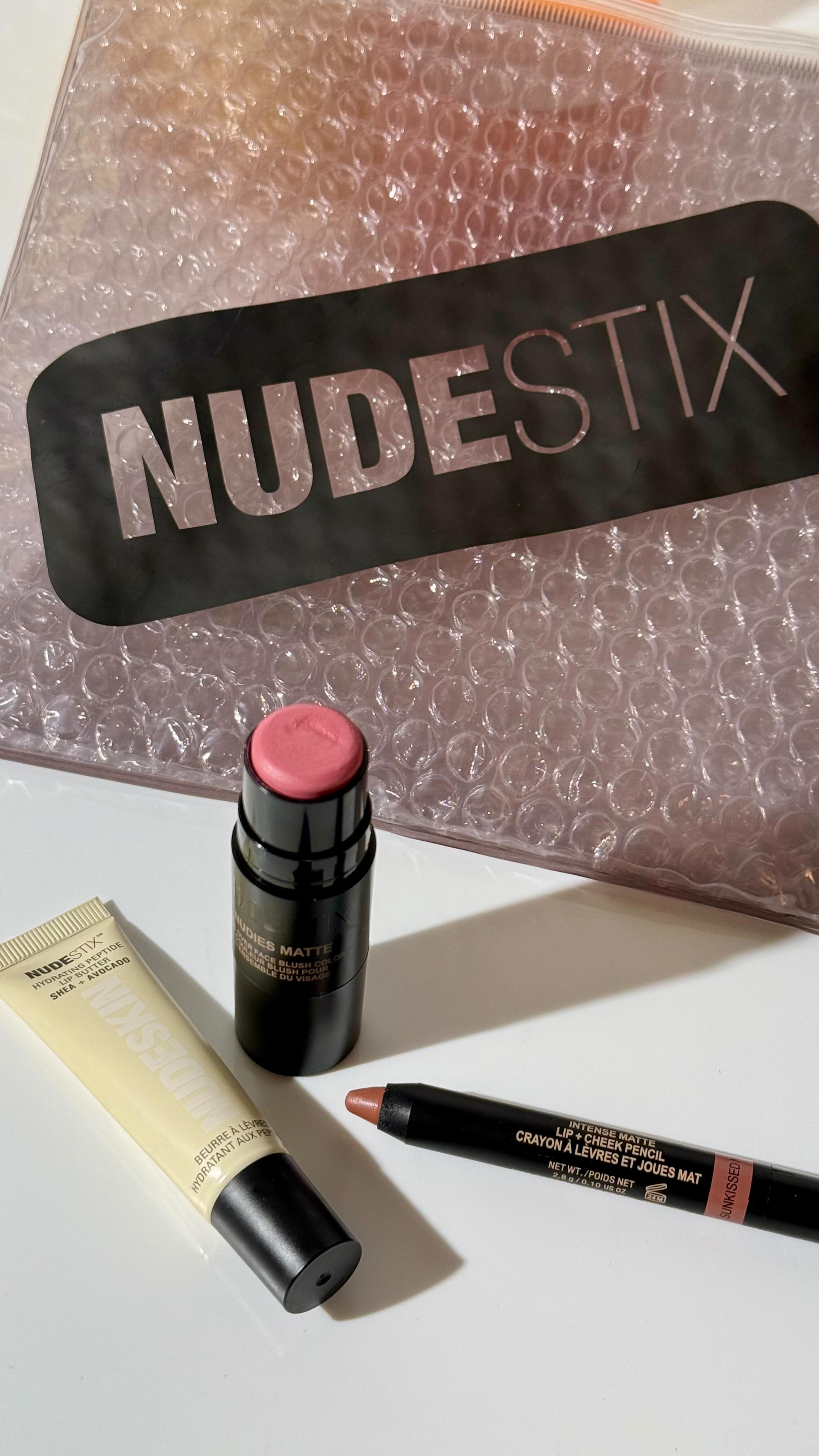 Instagram post by @becksamples101 for NUDESTIX. Caption reads: Sun’s out, blush sticks out ☀️💁🏻‍♀️

🔸 NUDIES....