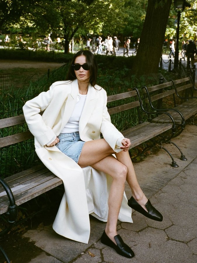 Instagram post by @kelseymerritt for Jimmy Choo. Caption reads: fall mornings in my @jimmychoo eliot slipper....