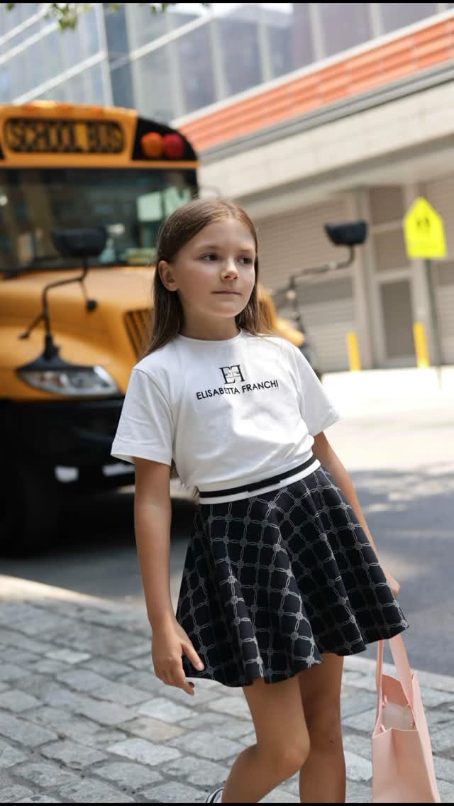 Instagram post by @emma_bobok for Elisabetta Franchi. Caption reads: [...] @eflamiabambina cute set by....