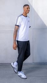 Instagram post by @enmanuelhansel for Champs Sports. Caption reads: Know no limits, stay ready like @enmanuelhansel....