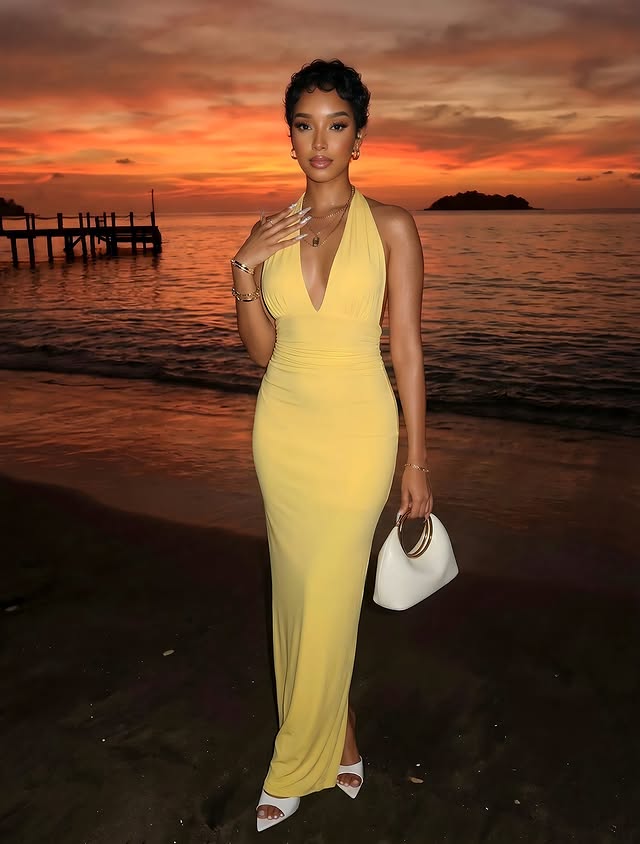 Instagram post by @ariananollan for Rebellious Fashion. Caption reads: [...] halterneck tie back maxi dress....