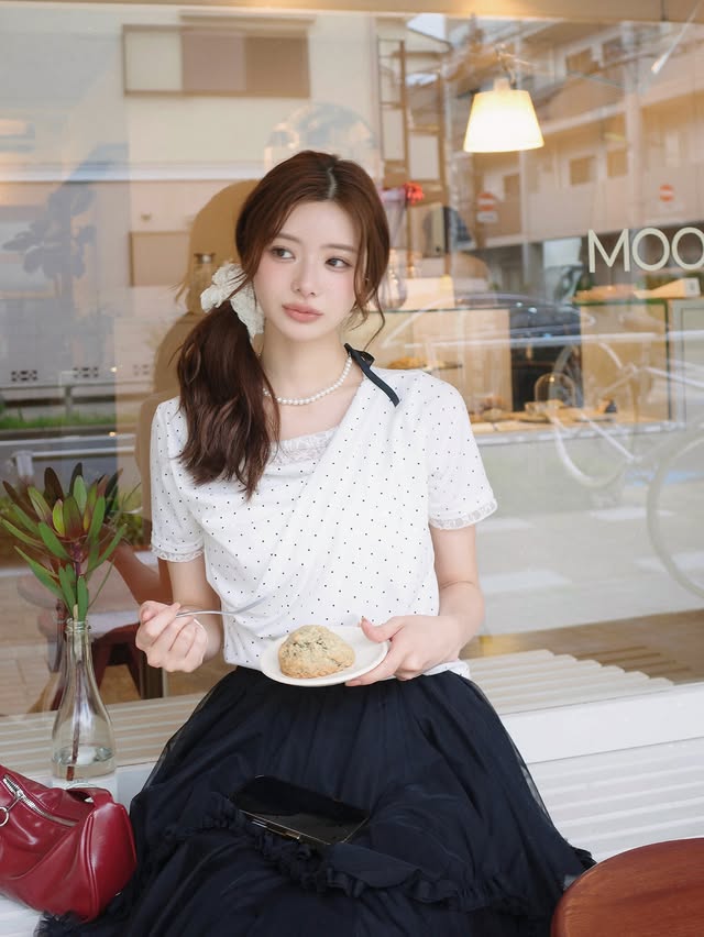 Instagram post by @non_niitsu for Moment. Caption reads: ☕️⋆⁺₊୨୧ tops: momentpulus skirt: frene #momentplus....