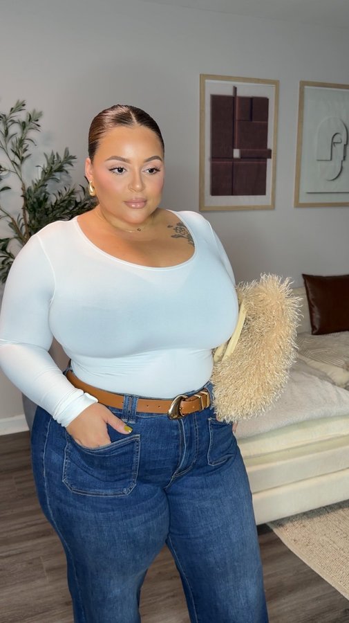 Instagram post by @scoutureox for Universal Standard. Caption reads: This is your sign to refresh your denim.....