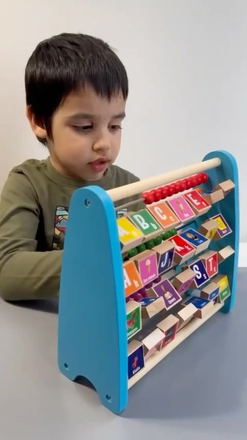 Instagram post by @julianandluca for Little Hippo Books. Caption reads: [...] wonderful first words abacus from....