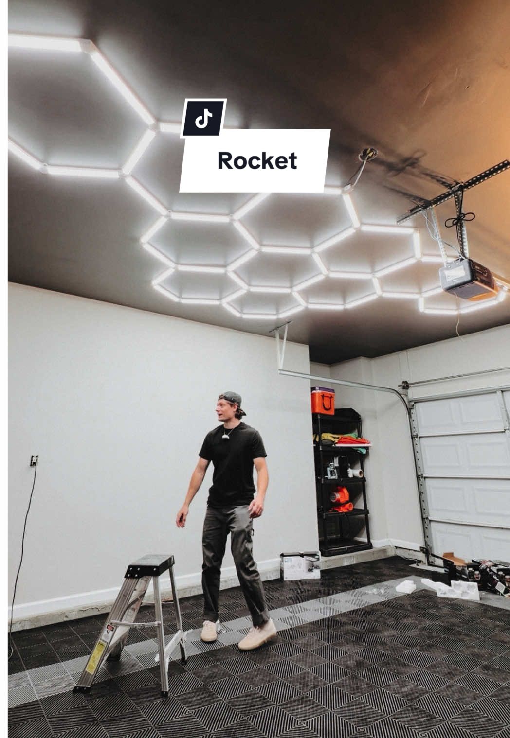 TikTok post by @drewpow for Rocket Mortgage. Caption reads: [...] like building out your garage and Rocket....