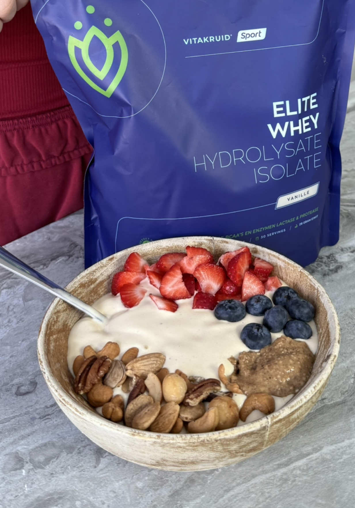 TikTok post by @myronkoops for Vitakruid. Caption reads: this smoothie bowl is a must-try at home! 🍓🥣....