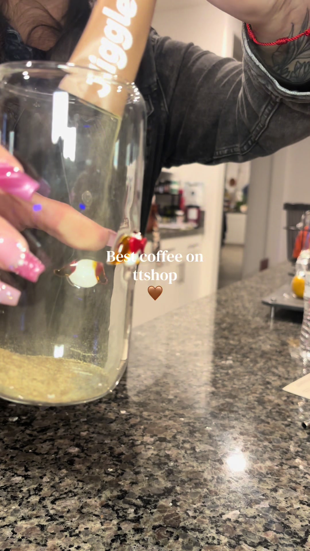TikTok post by @anylahh.01 for Jiggle Coffee. Caption reads: @Jiggle Coffee is my new bestie to get rid of....