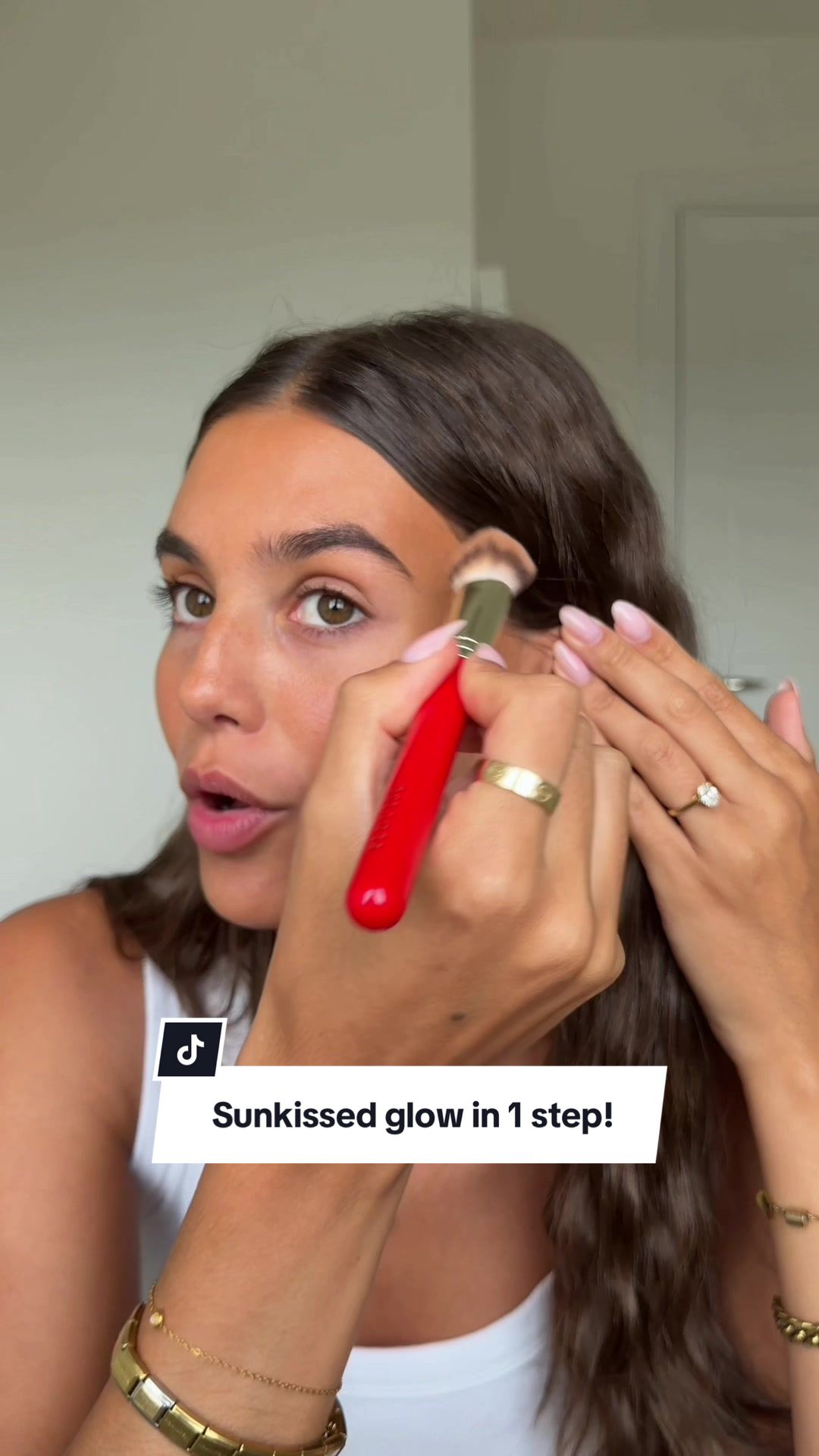 TikTok post by @__natalietaylor for Max Factor. Caption reads: A one step essential for glowy skin all year....