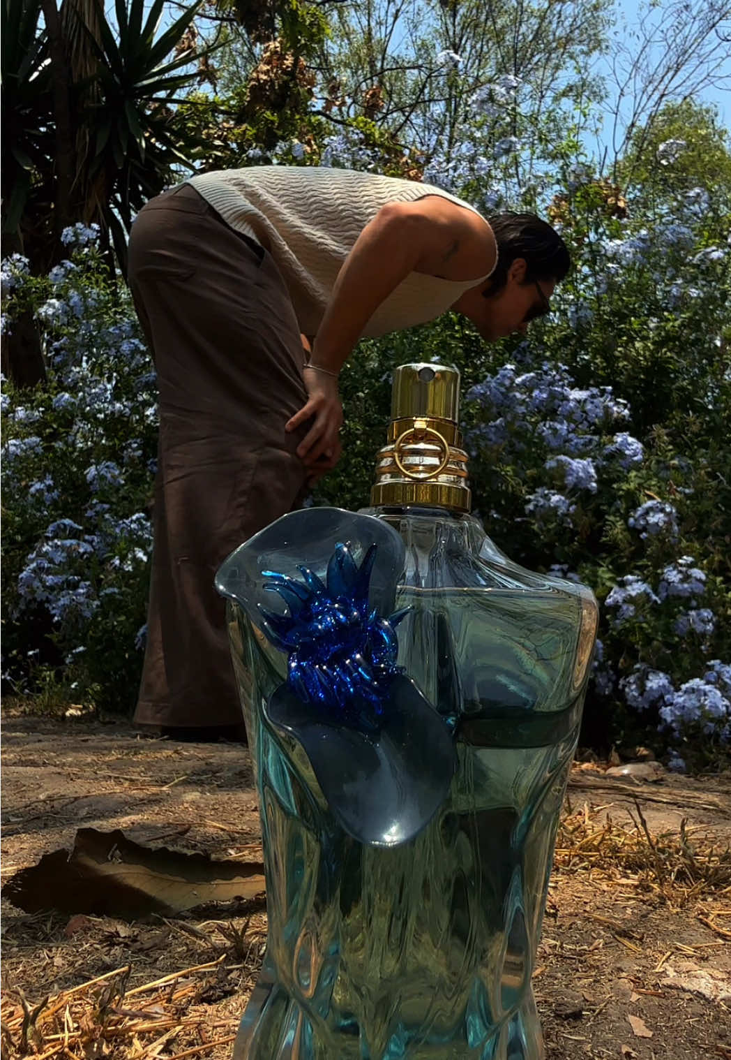 TikTok post by @marekcris_ for JeanPaulGaultier. Caption reads: Le Beau Flower Edition de @JeanPaulGaultier....